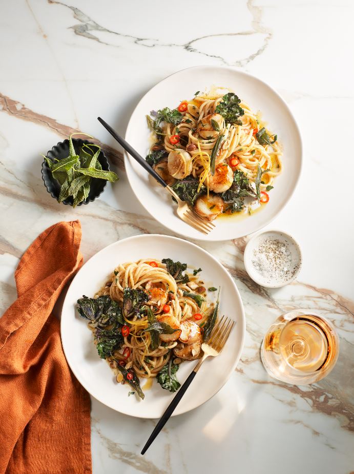 Abrolhos Island scallop bucatini in a brown butter, smoked almond & sage sauce, & sauteed kalettes with sweet and sour caper dressing.