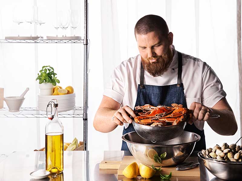 Alex Prichard creating a Blue Swimmer Crab recipe.