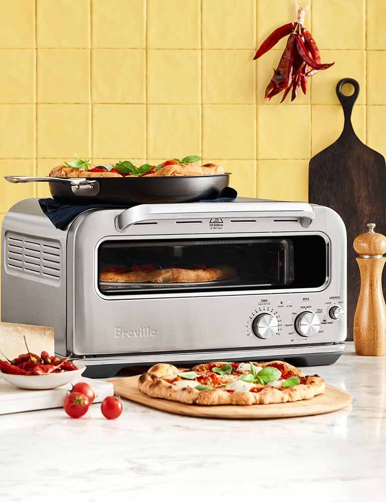 The Breville Pizzaiolo Benchtop Oven cooking Napolitana Pizza.
