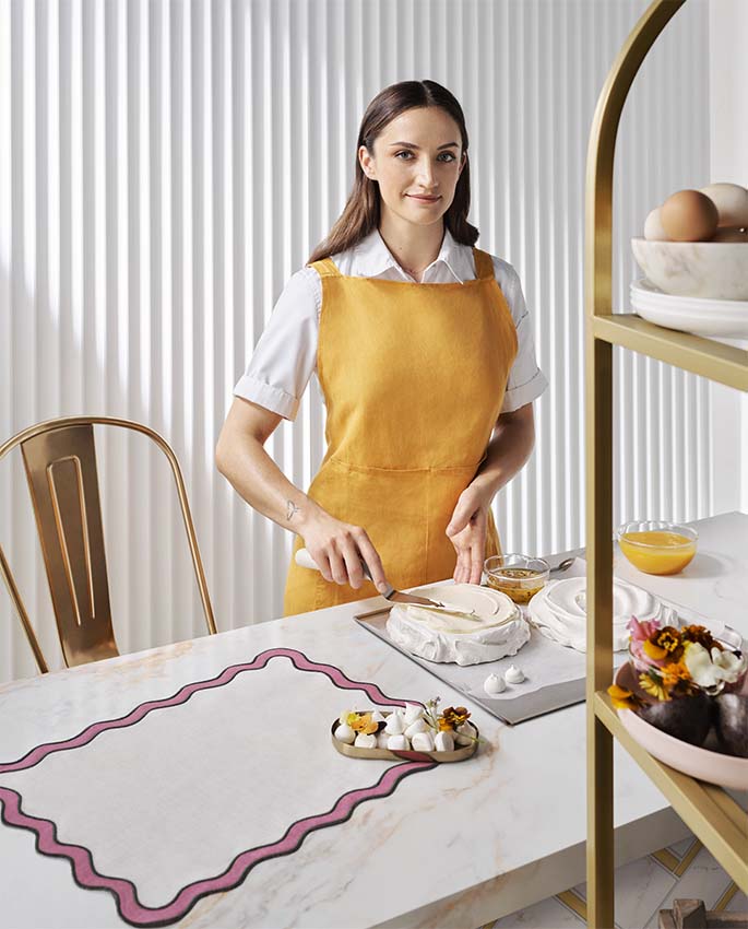 Chef Rhiann Mead making Passionfruit Meringue Cake.