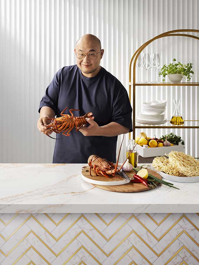 Chef Sam Young with Lobsters.