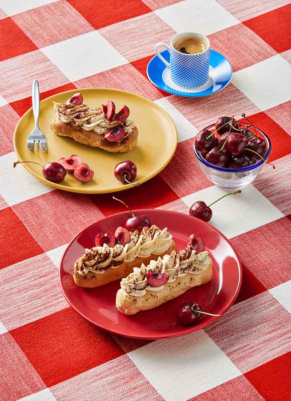 Plated Cherry Mocha Eclairs.