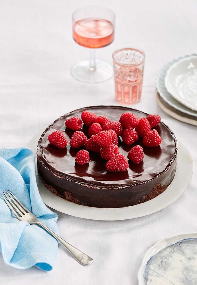 A Chocolate and Hazelnut Cake with espresso ganache and raspberries.