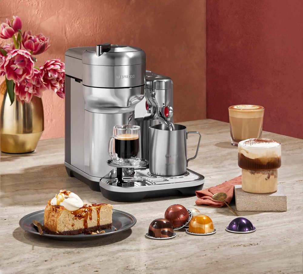 Coffee and Hazelnut New York Cheesecake & Iced Mocha recipes in front of a Nespresso Coffee Machine.