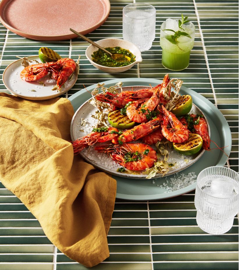 Crisp Saltbush and Pepper Tiger Prawns with grilled limes.
