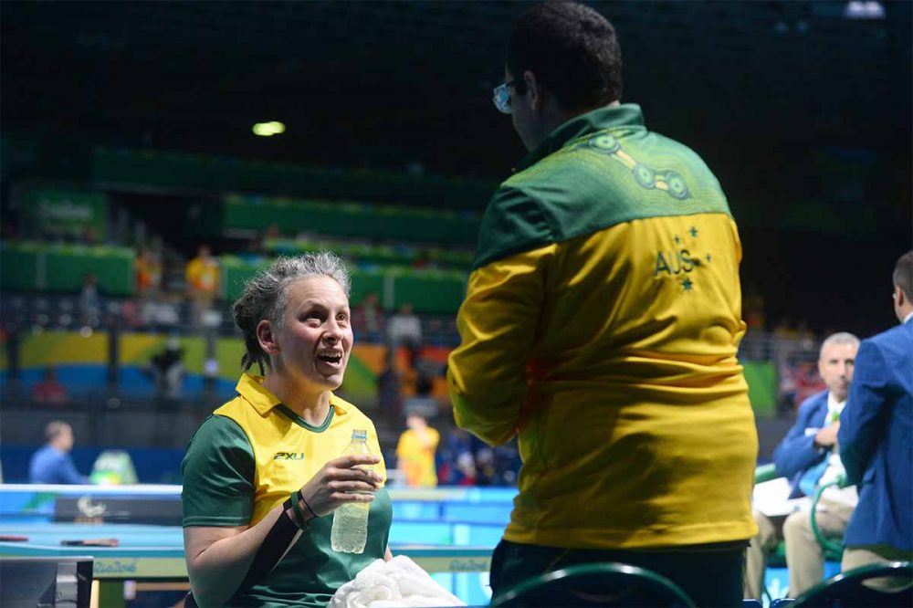 Danni Di Toro chatting with a member of the Australian team.