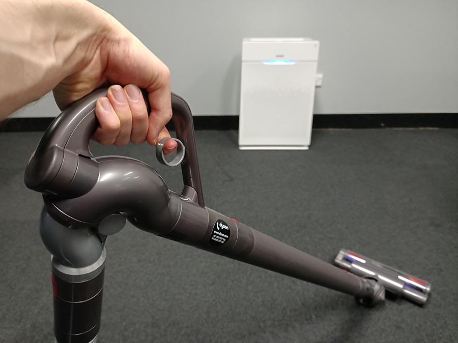 Using the suction trigger on the Dyson Cinetic Big Ball Vacuum.