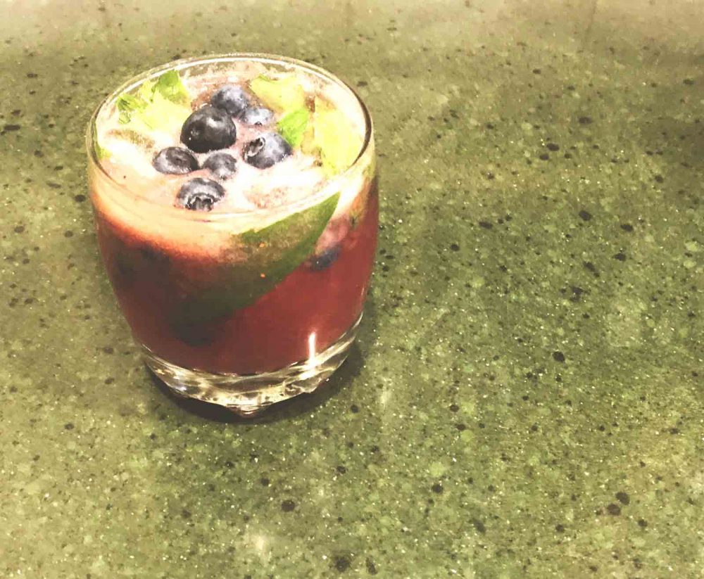 Fresh Blueberry Mojito created with the SodaStream Spirit One Touch Sparkling Water Maker.