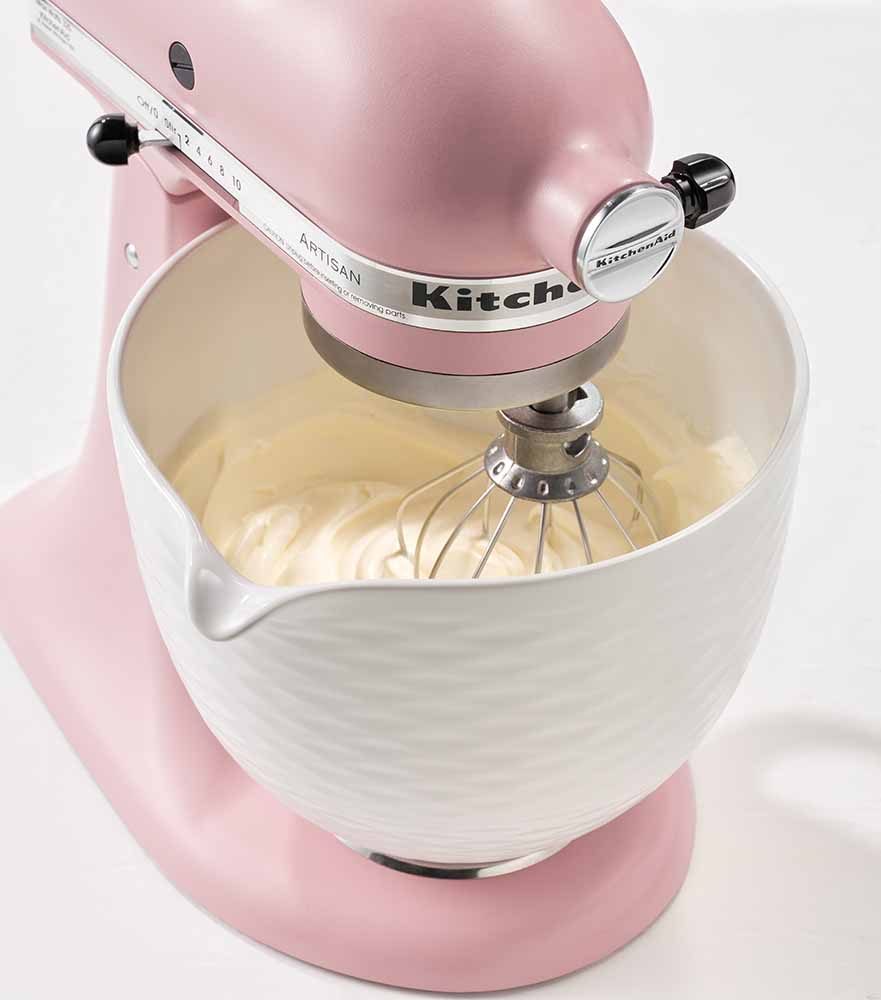 Using the KitchenAid Embossed White Chocolate Ceramic Bowl and Pink Mixer to create a pavlova mix.