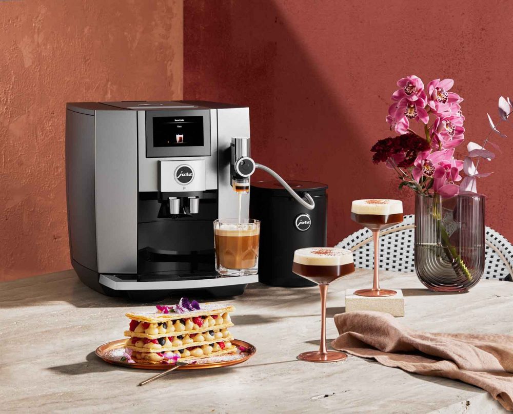 Mille Feuille & Ginspresso Martini recipes in front of a Jura Coffee Machine.