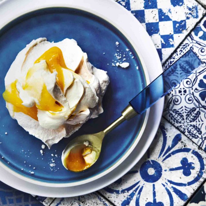 Mini Pavlovas with Crème Fraîche, Mango, and Tropical Curd recipe.