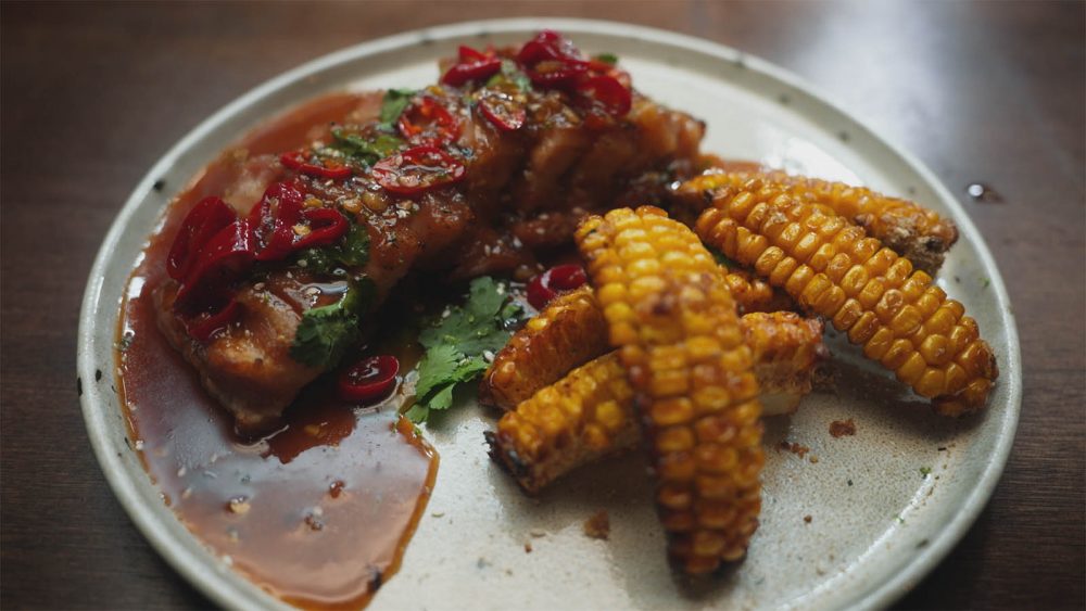 Pork Belly with Whiskey Sauce on a plate.