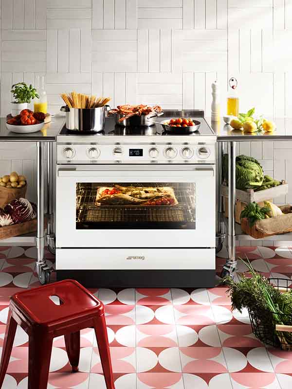 The Smeg 900mm Portofino Pyrolytic Freestanding Cooker with Induction Cooktop.