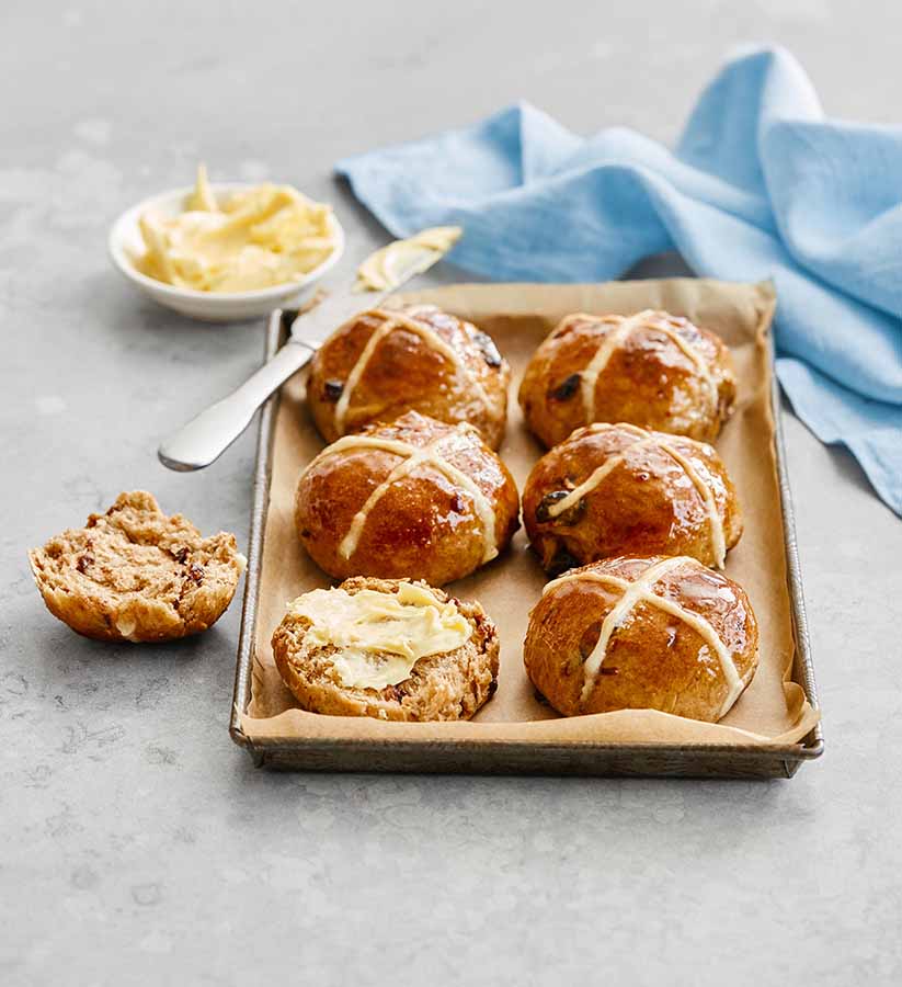 Sour Cherry Hot Cross Buns with butter.