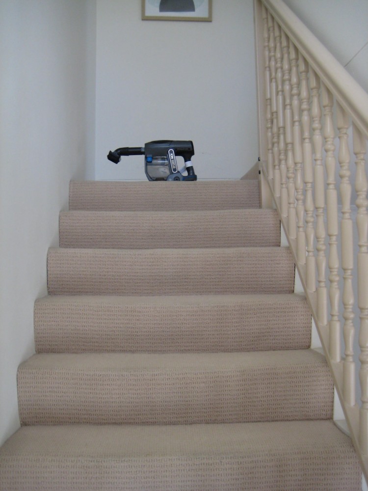Vacuuming Carpet