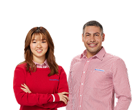 Two smiling Harvey Norman team members in uniform, ready to help with Samsung tablet advice